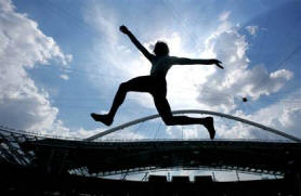 GREEK ATHLETE VASSILIADIS DURING LONG JUMP INSIDE ATHENS OLYMPIC STADIUM DURING GREEK CHAMPIONSHIPS